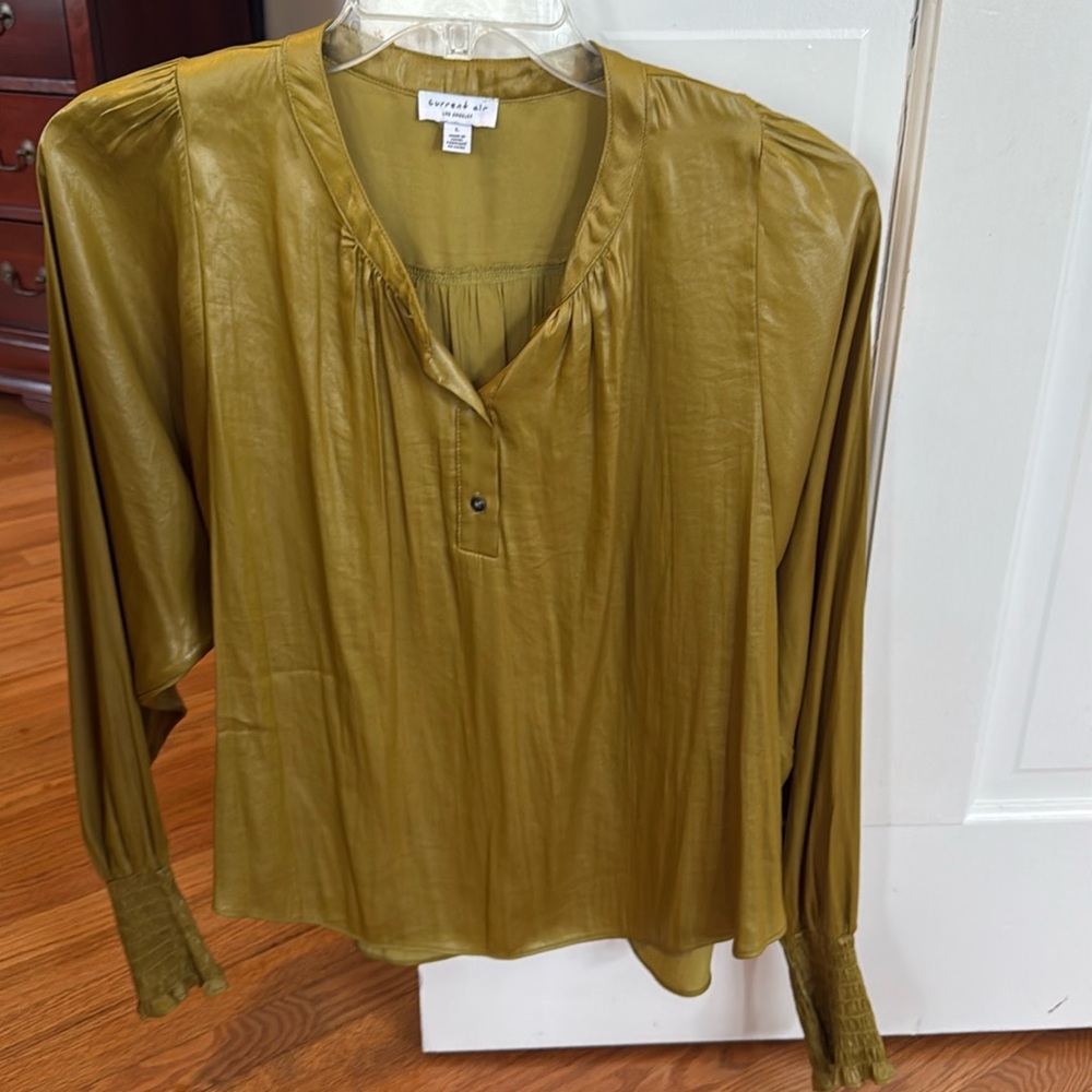 Anthropologie too; looks like leather; moves like silk